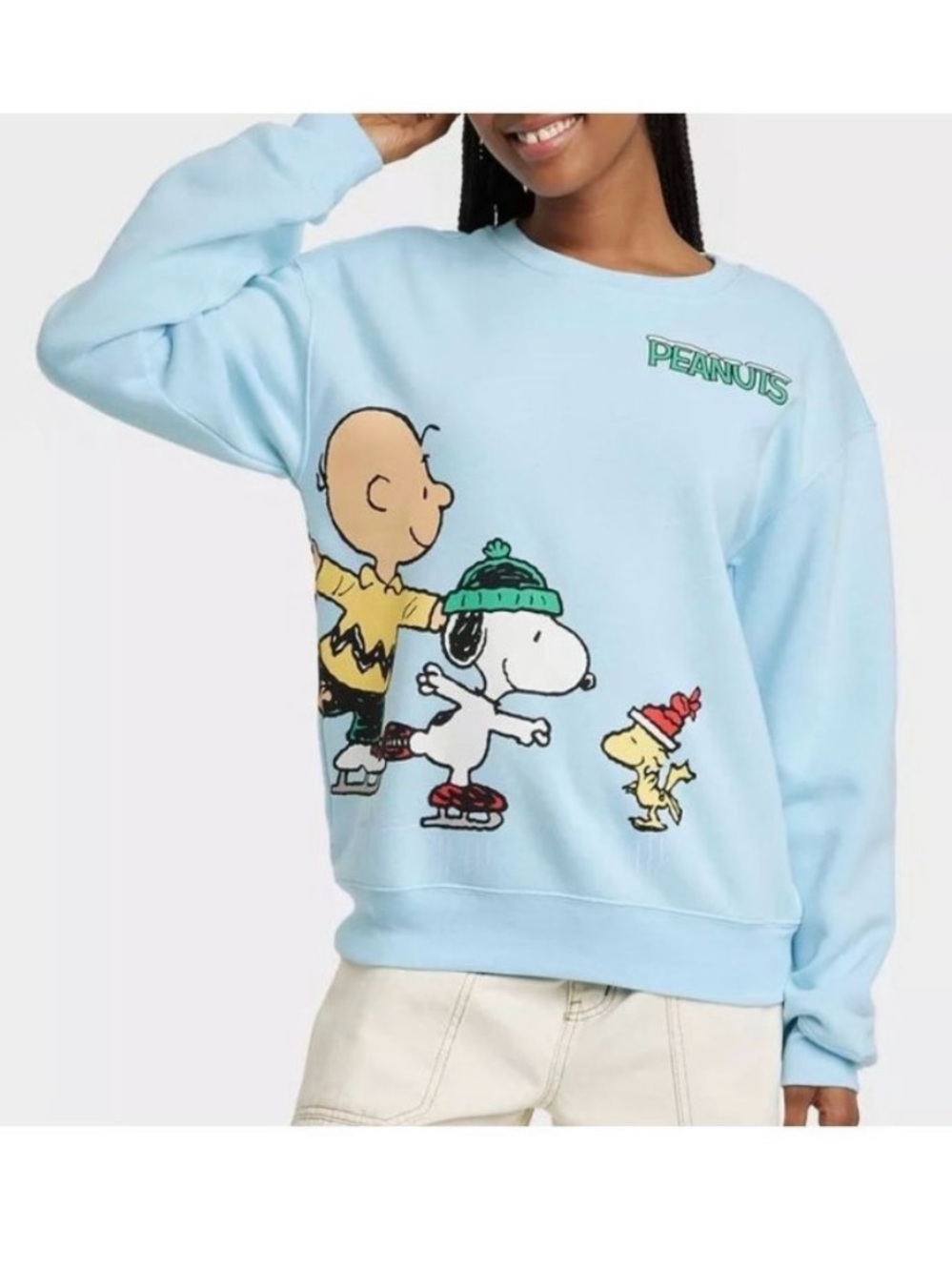 Peanuts Light Blue Crewneck Sweatshirt with Ice Skating Graphic